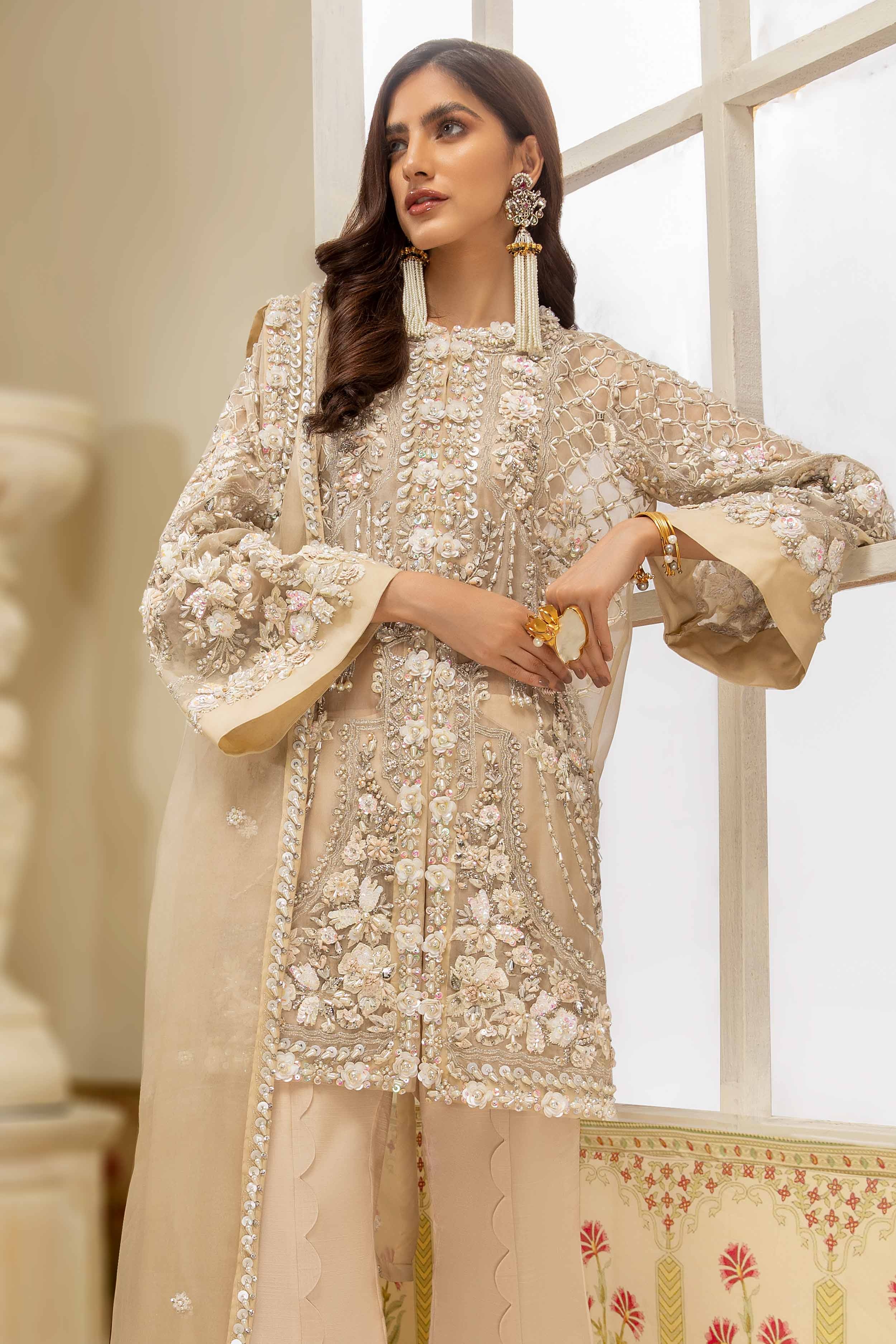 Ivory Luxe pakistani fashion outfit in ivory tones.